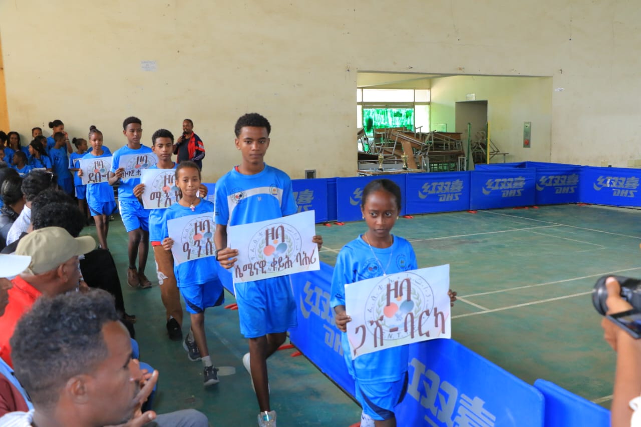 Young participants gathered at the table tennis venue
