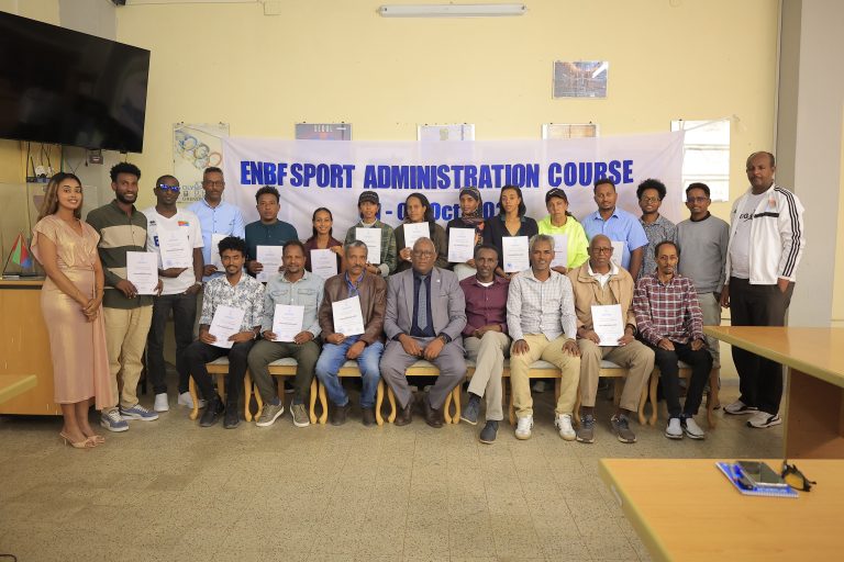 ENBF sports administration course participants and officials with completion certificates.